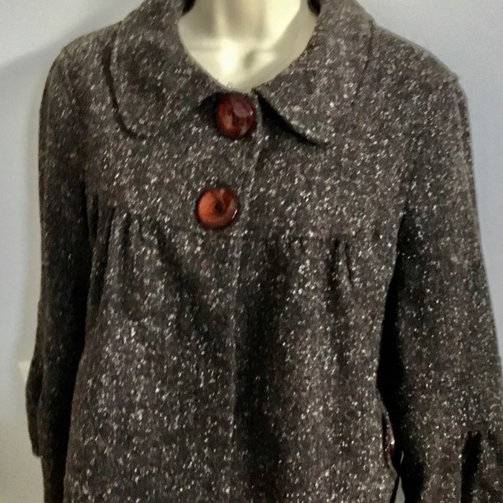 Brown tweed peplum elbow length jacket.  Size 14W Made in France.  New condition